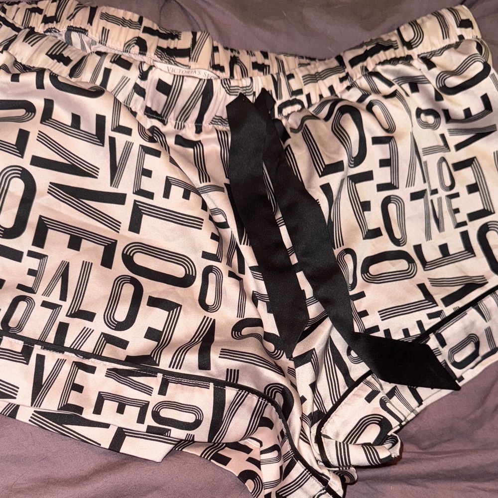 Black and pink sleep shorts